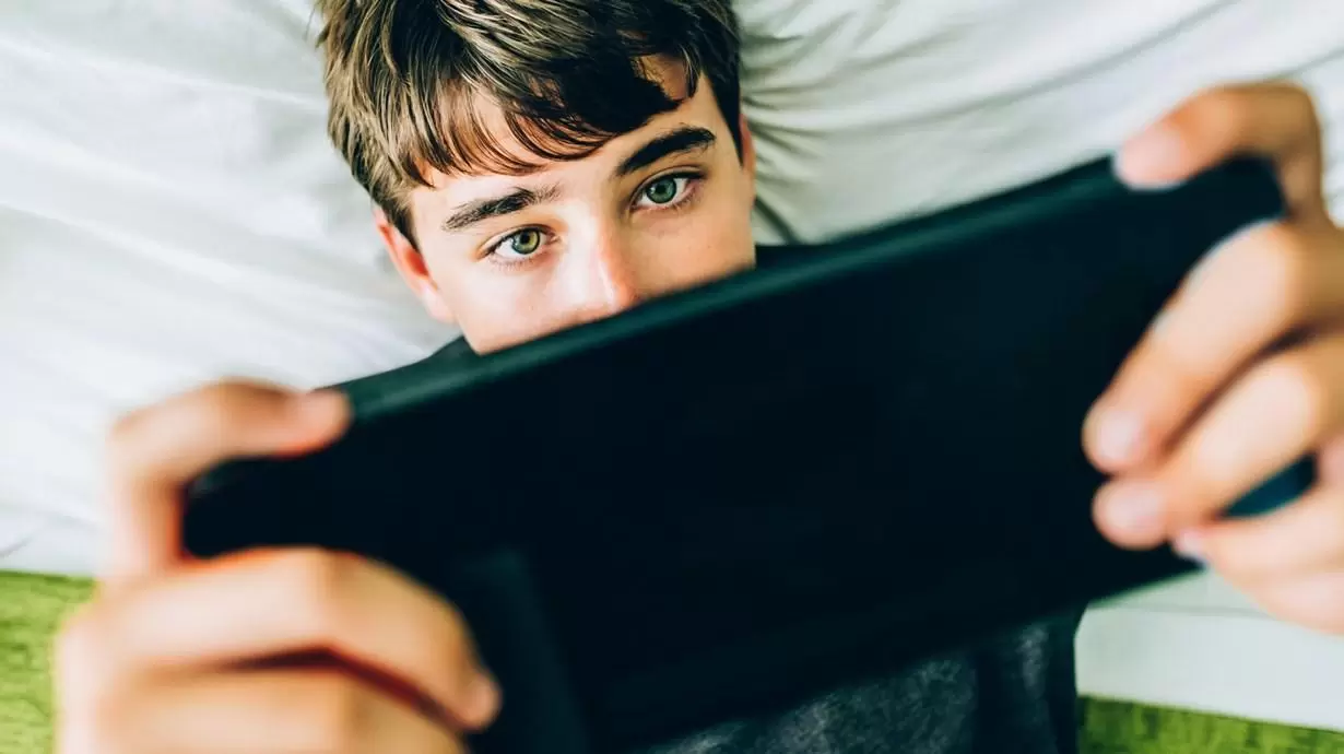 Teen Gaming On Phone | Online Safety