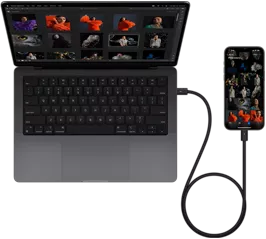 iPhone 15 Pro Max conectado a una MacBook Pro de 14 pulgadas con USB-C